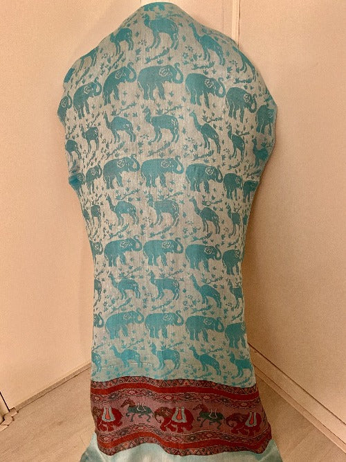 Handcrafted Silk Scarf. Colour Broken white with baby blue, mixed red band. Elephant and camel pattern. 471: Size: +- 200x80 cm. 