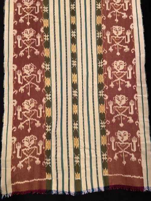 Handcrafted Ikat  professionally woven cotton of the highest grade.  Info: You Can Use a Scarf,Blanket. Black, broken white, brown and dark green with petro colours with straight lines with traditional human image.453    Size:115x215cm
